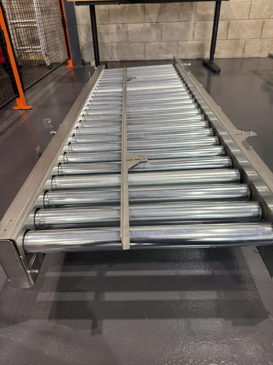 Fox Precision Tooling finished roller conveyor system on the workshop floor