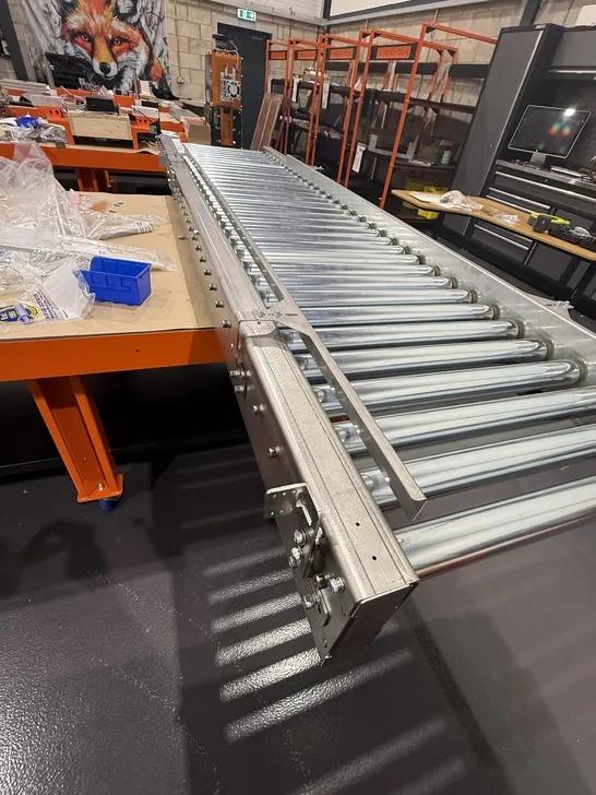 Fox Precision Tooling roller conveyor under assembly in the workshop
