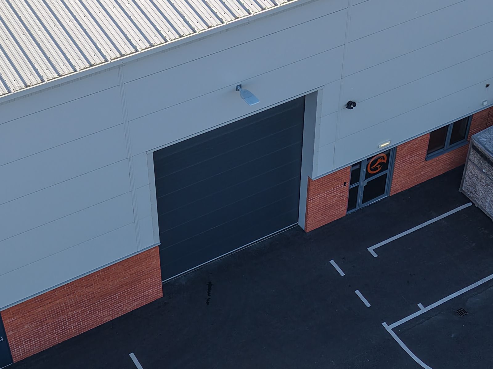 Aerial view of Fox Precision Tooling's Derby workshop, showing the loading bay entrance and Fox logo