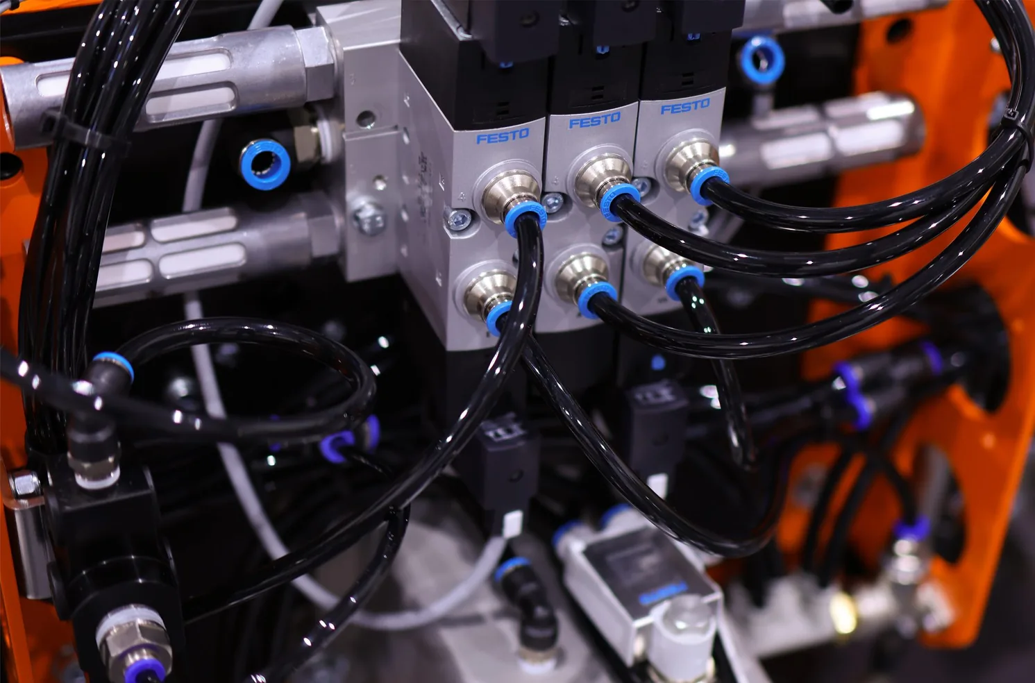 Close-up detail of Festo valve bank wiring on a brick and tile EOAT