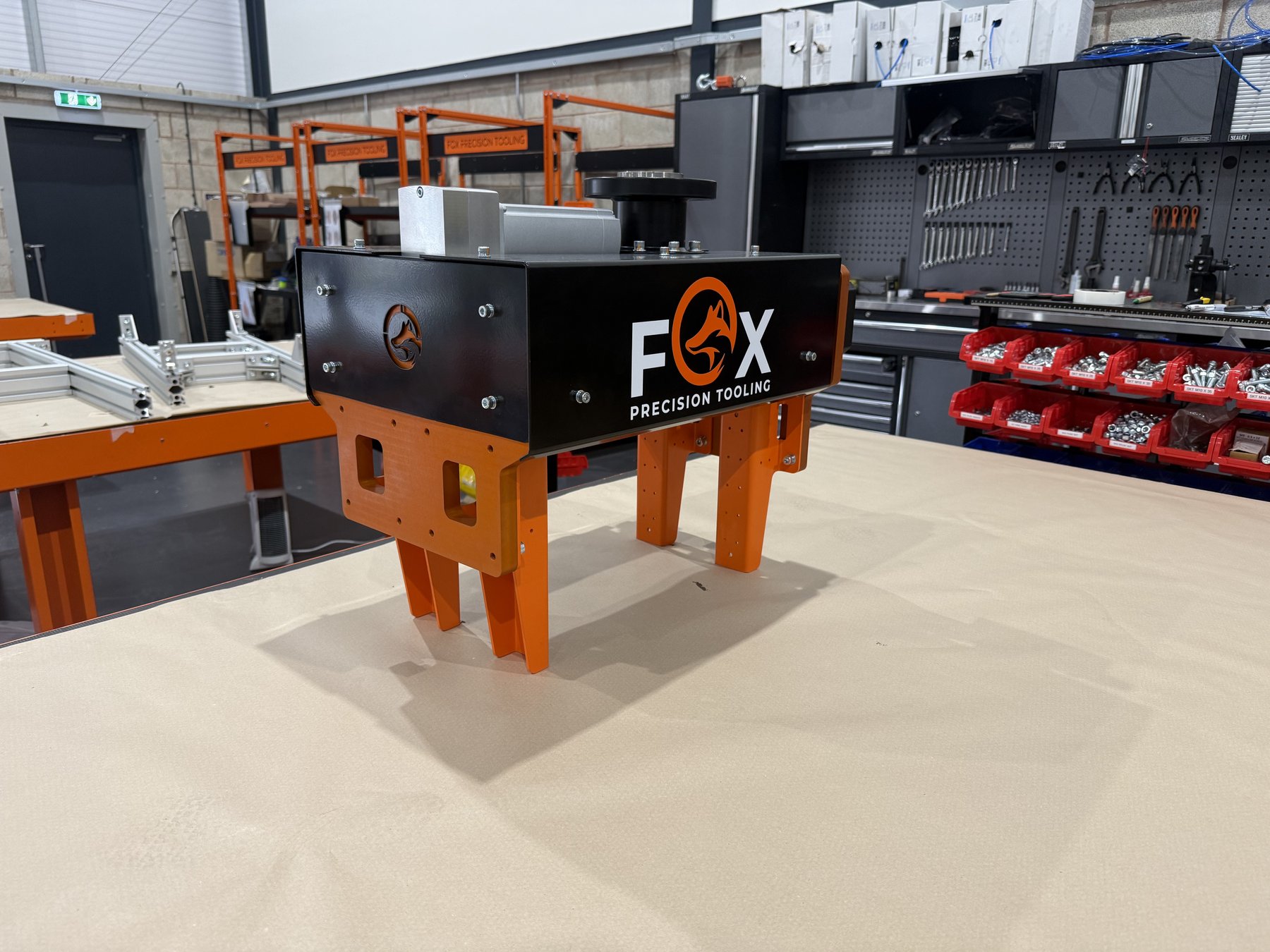 Fox Precision Tooling branded EOAT gripper module on the test bench