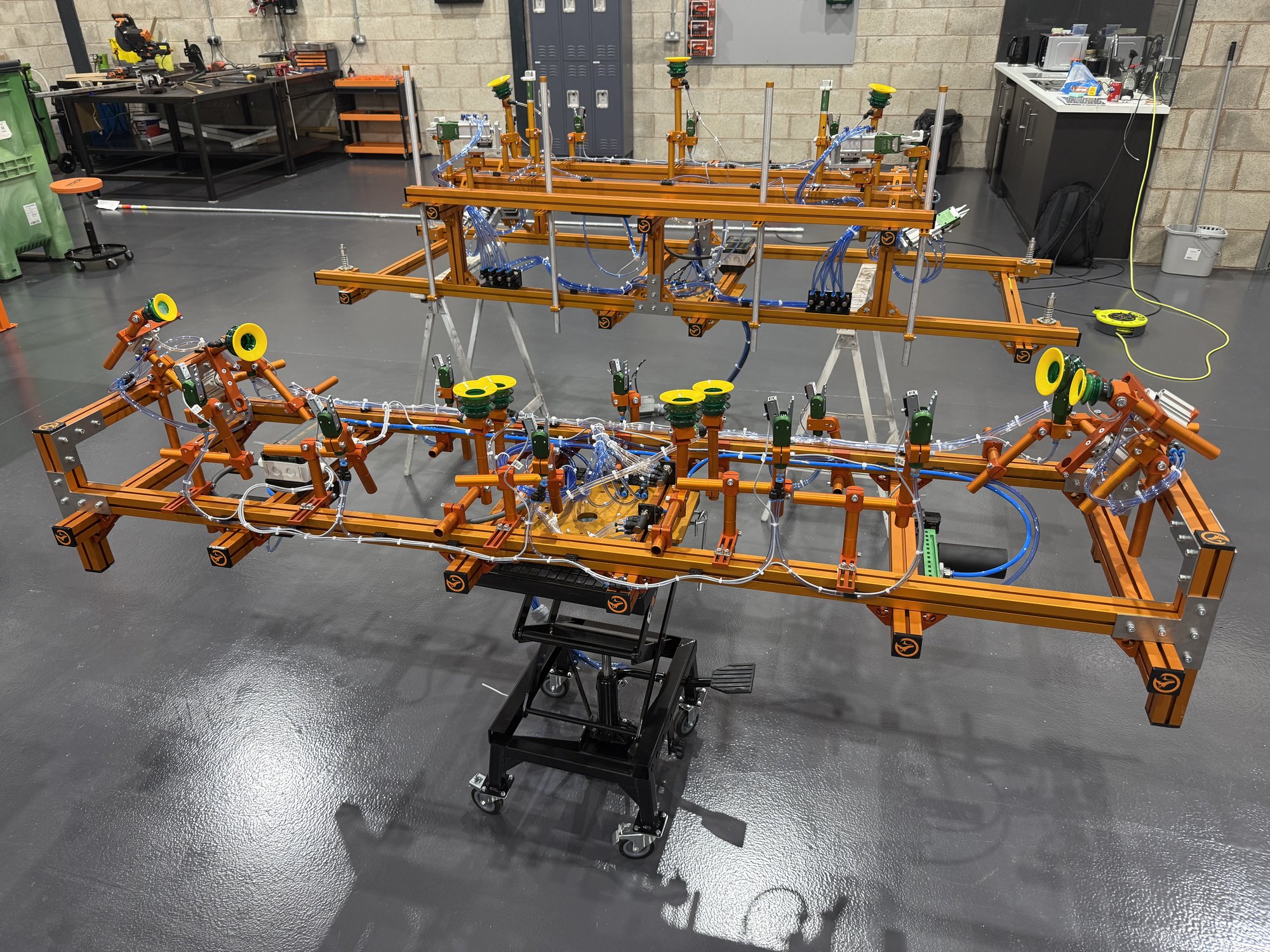 Fox Precision Tooling gantry EOAT frame on a workshop lift stand