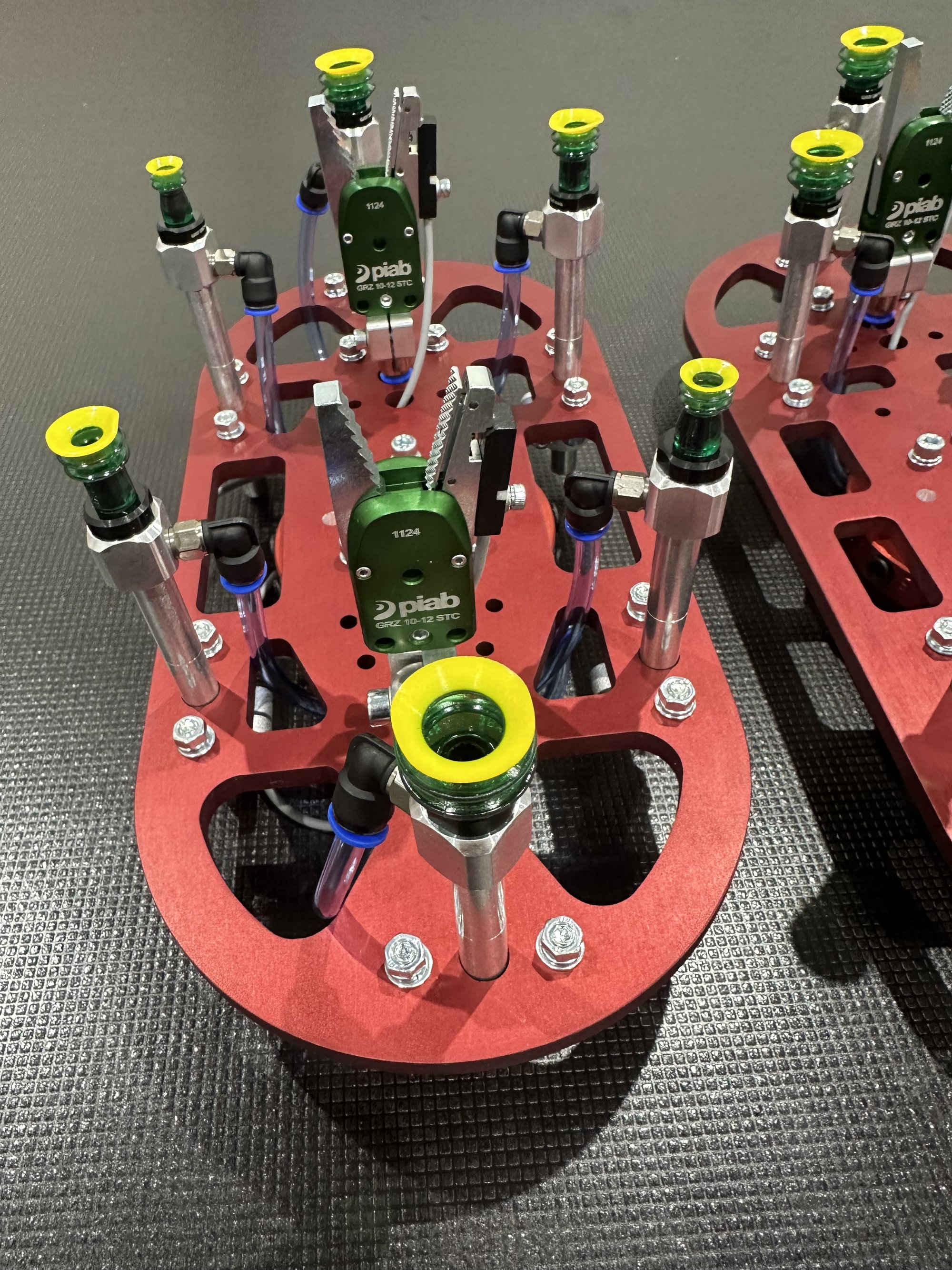Fox Precision Tooling gantry end plate detail with Piab vacuum cup grippers