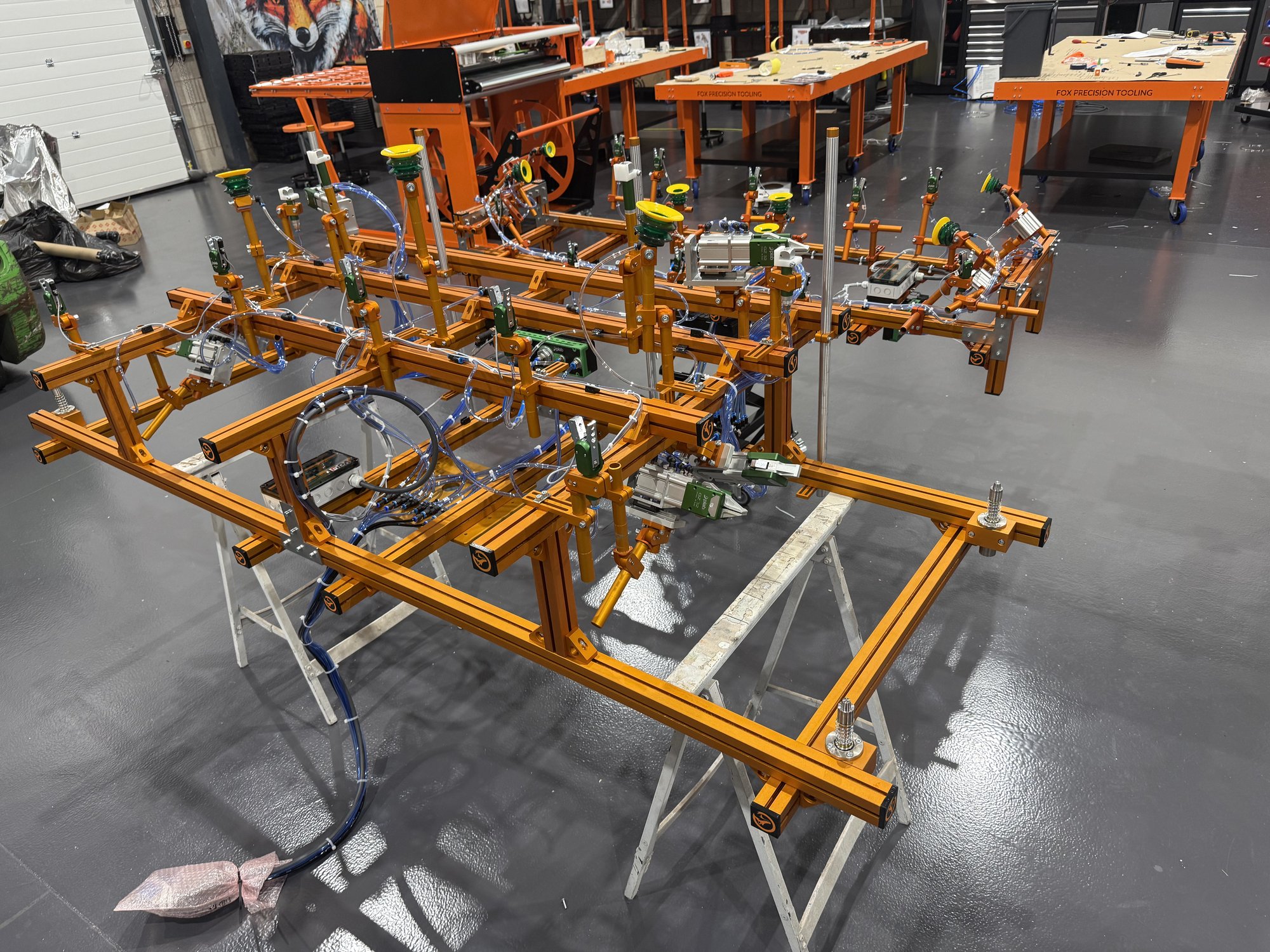 Fox Precision Tooling gantry EOAT frame, orange extruded aluminium with vacuum cup grippers
